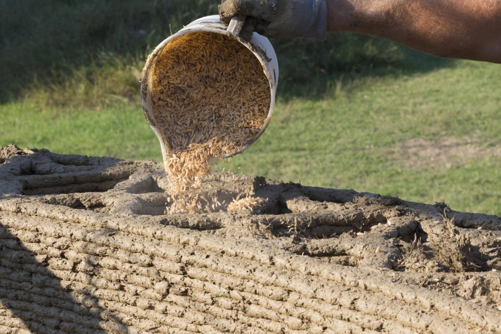 3D printed wall using local materials like husk. Photo via WASP.