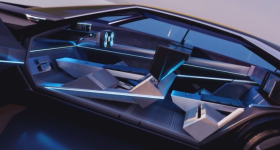 The interior of Peugeot’s Inception Concept car uses velvet material that extends from the seats to the floor and features stunning 3D patterns created with Stratasys’ 3DFashion technology. Image via Stratasys.